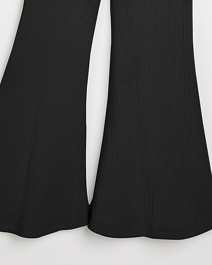 Girls black ribbed seam front flared trousers