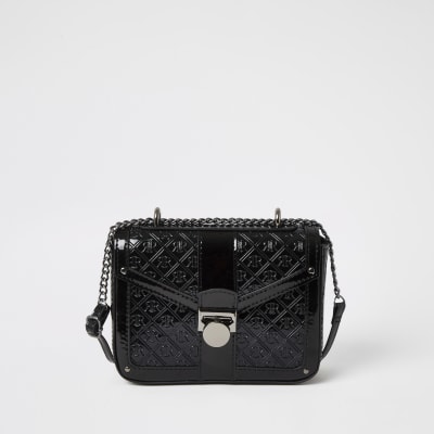 patent cross body bag