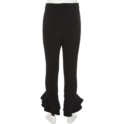 Girls black ruffle hem leggings