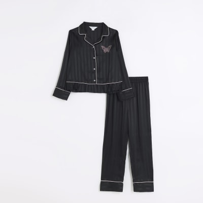 Girls black satin long sleeve pyjama set River Island