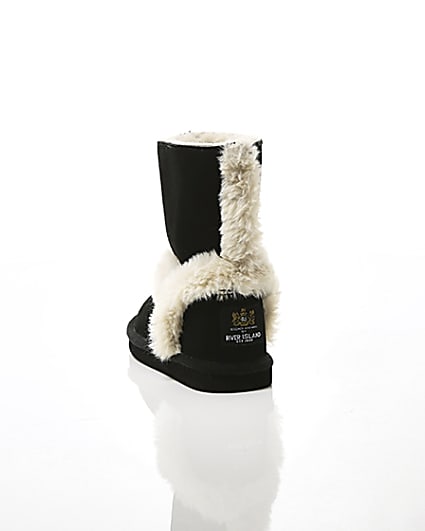 360 degree animation of product Girls black suede faux fur lined ankle boots frame-17