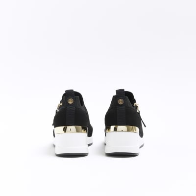 Girls black wedge trainers | River Island