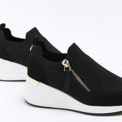 Girls black wedge trainers | River Island