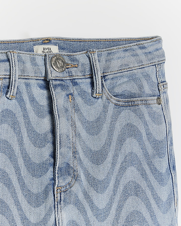 Girls blue printed wave skinny jeans