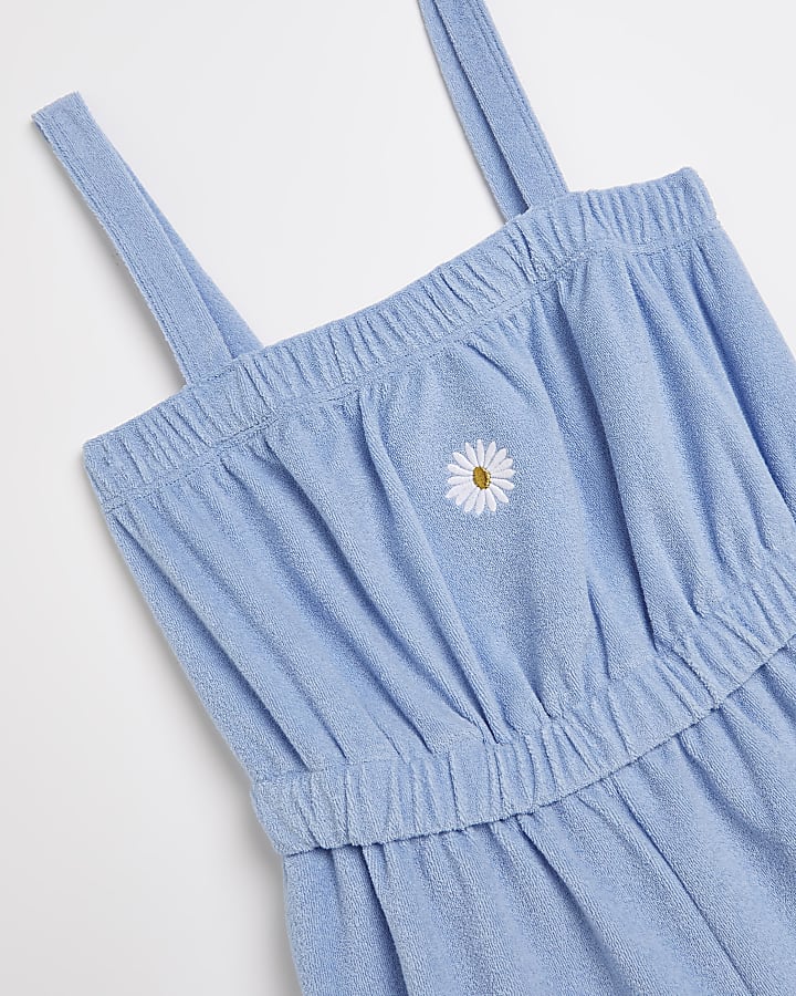 Girls blue towelling daisy playsuit