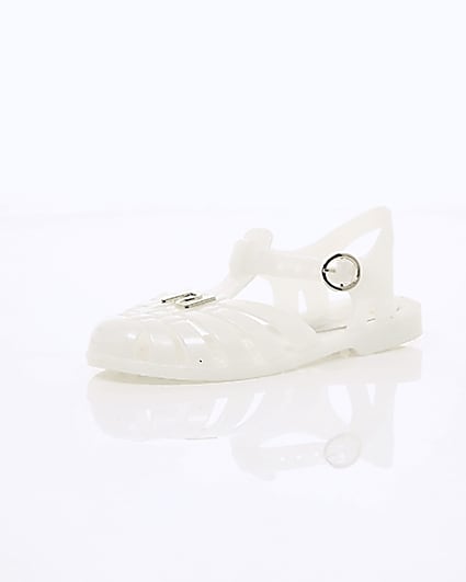 360 degree animation of product Girls cream caged jelly sandals frame-0