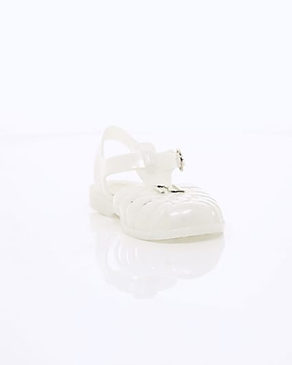 360 degree animation of product Girls cream caged jelly sandals frame-5