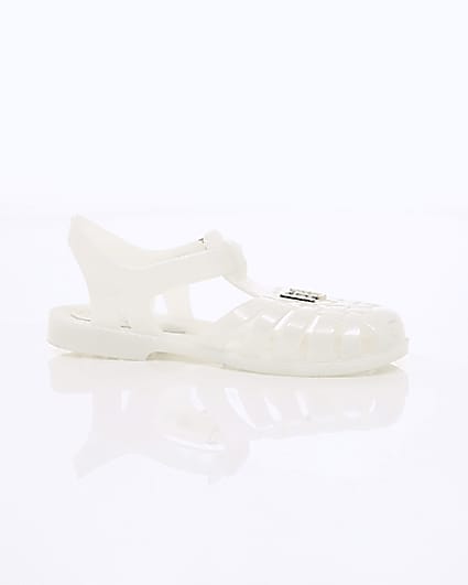 360 degree animation of product Girls cream caged jelly sandals frame-8