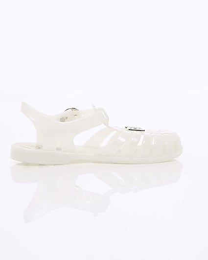 360 degree animation of product Girls cream caged jelly sandals frame-10