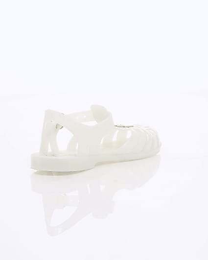 360 degree animation of product Girls cream caged jelly sandals frame-13