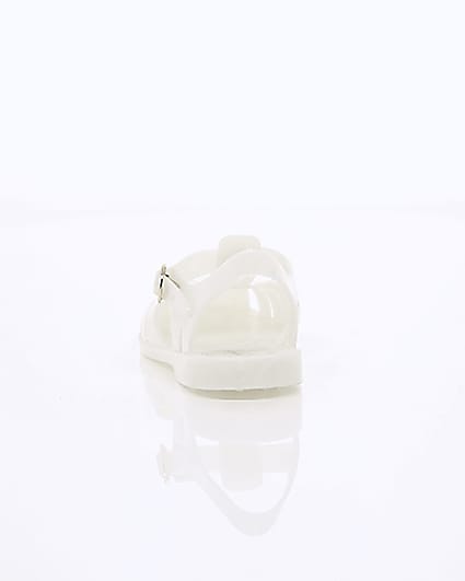 360 degree animation of product Girls cream caged jelly sandals frame-16