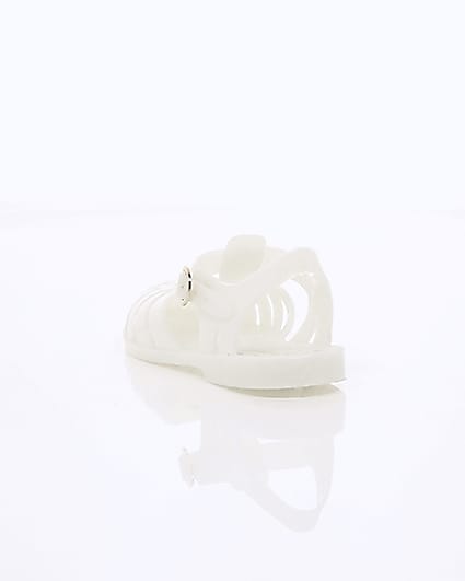 360 degree animation of product Girls cream caged jelly sandals frame-17
