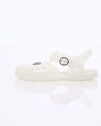 360 degree animation of product Girls cream caged jelly sandals frame-21