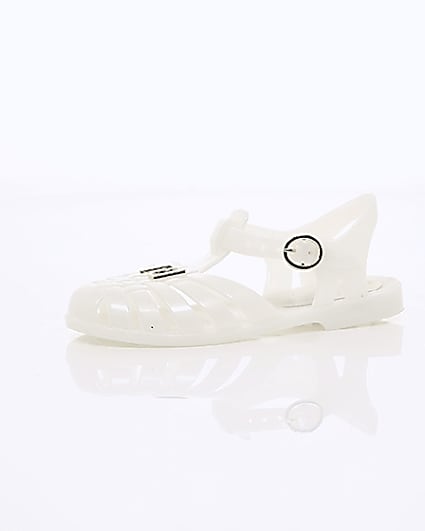 360 degree animation of product Girls cream caged jelly sandals frame-23