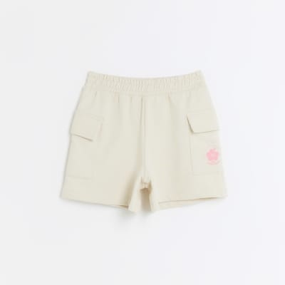 Girls cream cargo shorts River Island