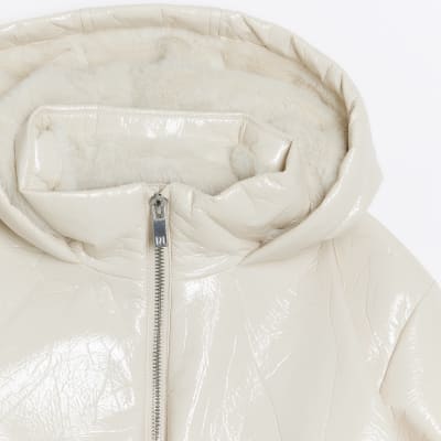 Girls cream hooded rain coat River Island
