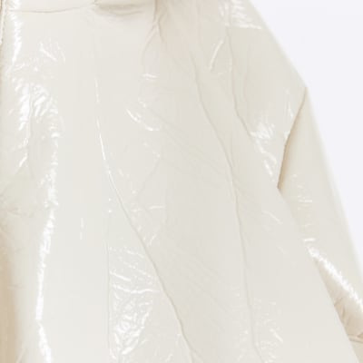 Girls cream hooded rain coat River Island