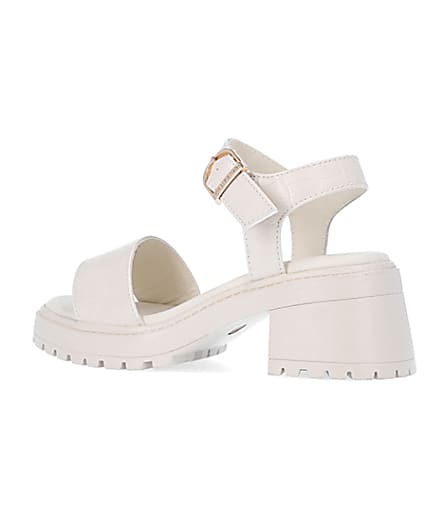 360 degree animation of product Girls cream patent chunky heeled sandals frame-5