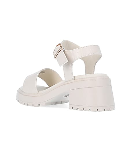 360 degree animation of product Girls cream patent chunky heeled sandals frame-6