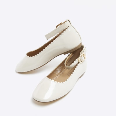 Girls cream patent scallop ballerina shoes River Island