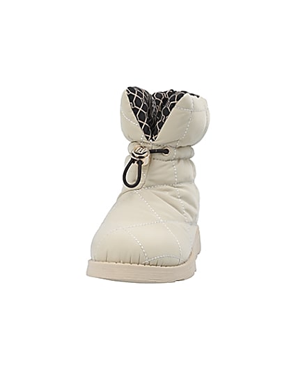 360 degree animation of product Girls cream RI puffer snow boots frame-22