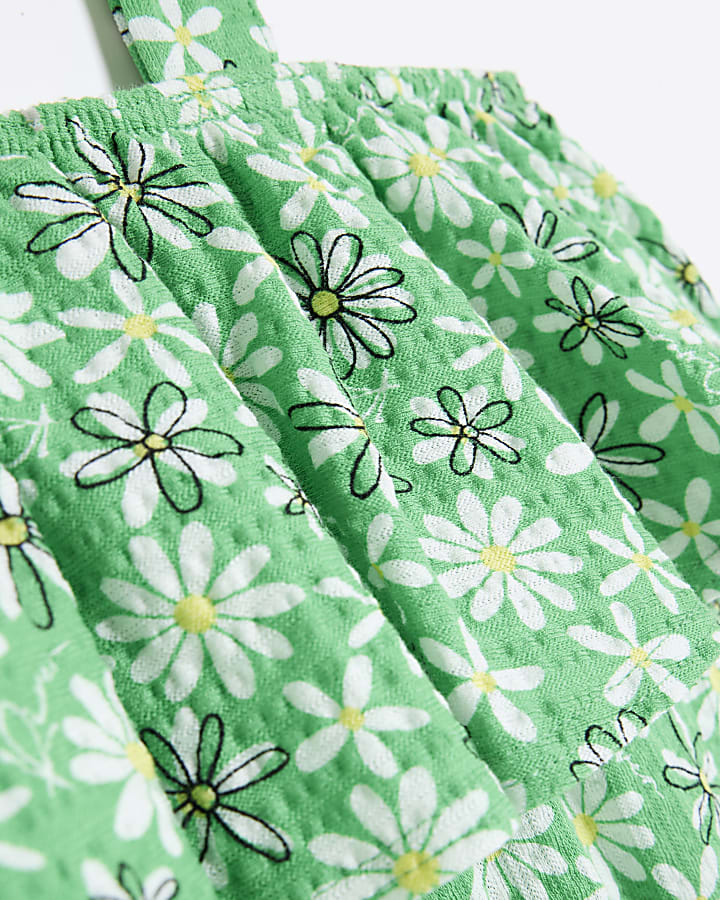 Girls green daisy floral print playsuit