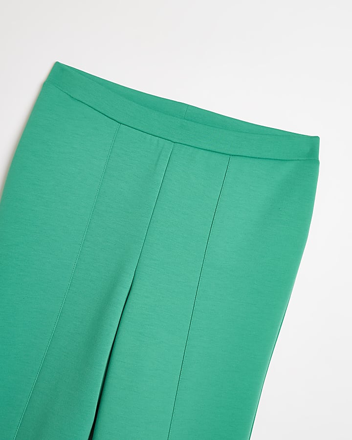 Girls green flare split hem trousers