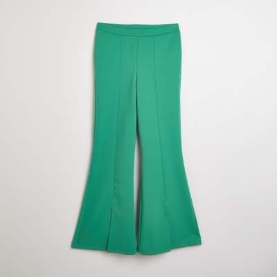 green flare trousers