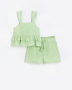 Girls green peplum top and shorts set