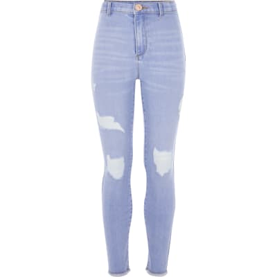 Girls light blue ripped Kaia jeggings | River Island