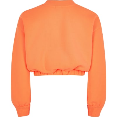 girls orange sweatshirt