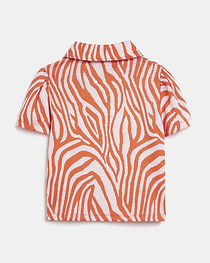 Girls orange zebra print polo shirt