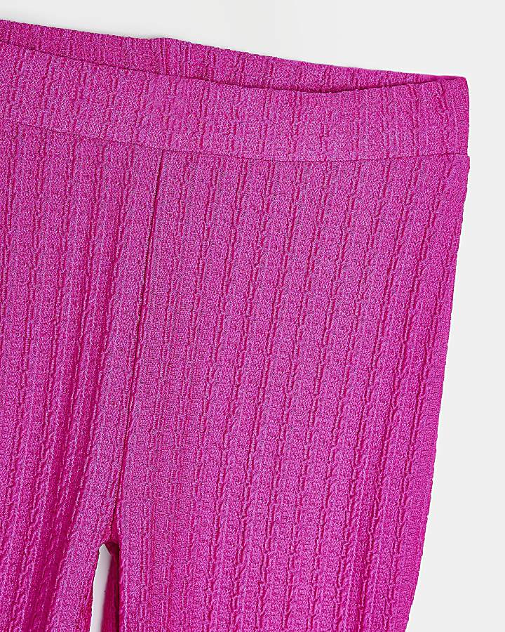 Girls pink ribbed flared trousers