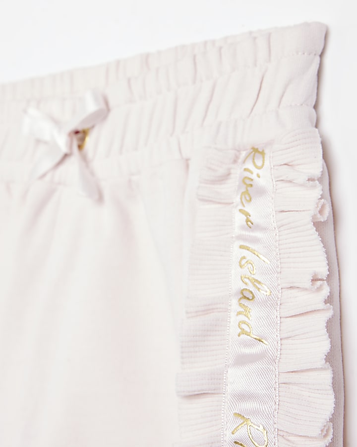 Girls pink ruffle detail satin trim shorts