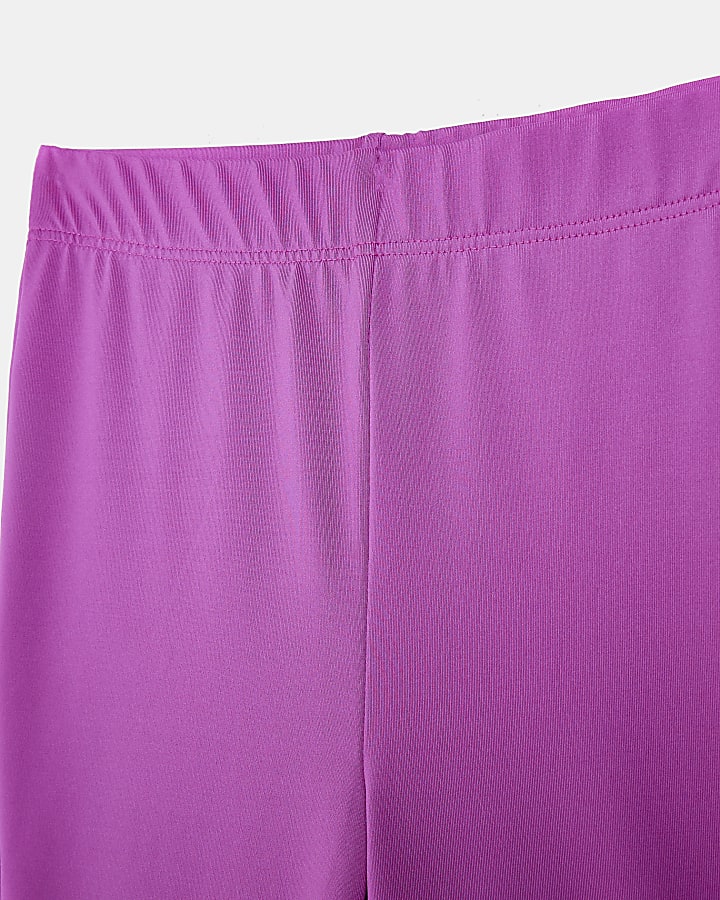 Girls purple slinky flared trousers