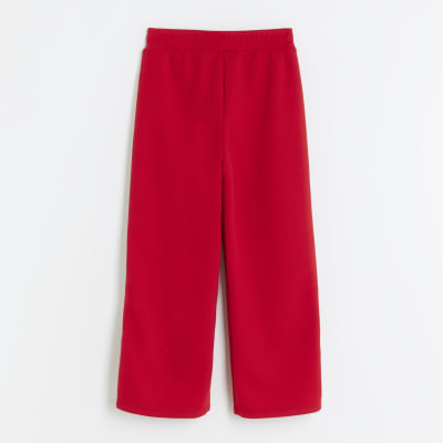 Girls red side popper joggers | River Island