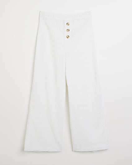 Girls white broderie wide leg trousers