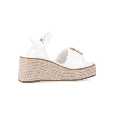 360 degree animation of product Girls white buckle detail wedge sandals frame-14