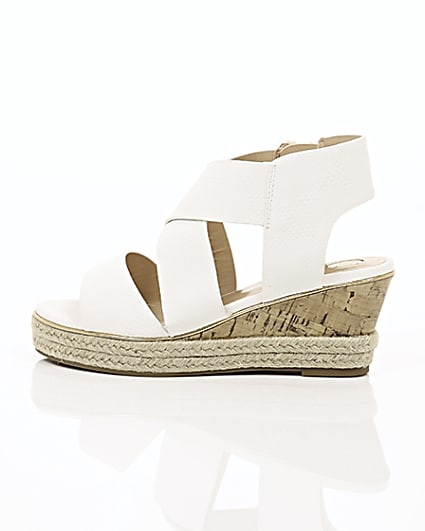 360 degree animation of product Girls white cork wedge sandals frame-21