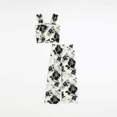 Girls white floral crop top and trousers set