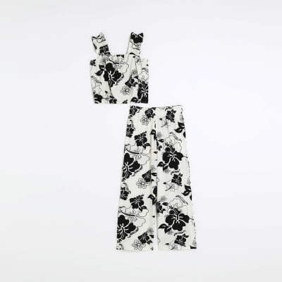 Girls white floral crop top and trousers set