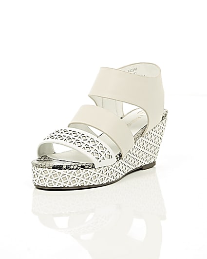 360 degree animation of product Girls white laser cut wedges frame-1