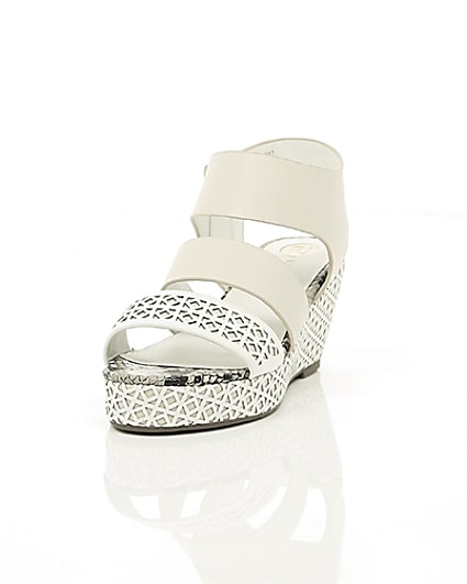 360 degree animation of product Girls white laser cut wedges frame-2