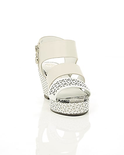 360 degree animation of product Girls white laser cut wedges frame-5
