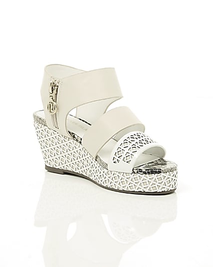 360 degree animation of product Girls white laser cut wedges frame-7