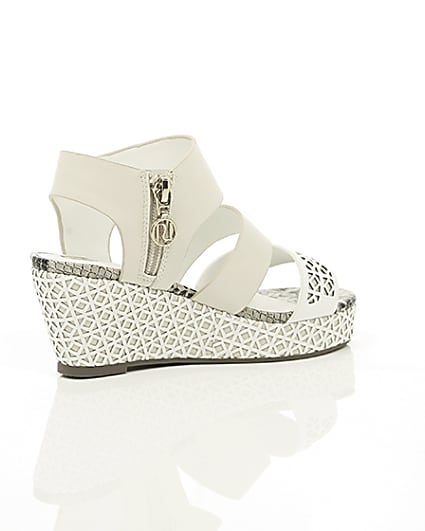 360 degree animation of product Girls white laser cut wedges frame-12