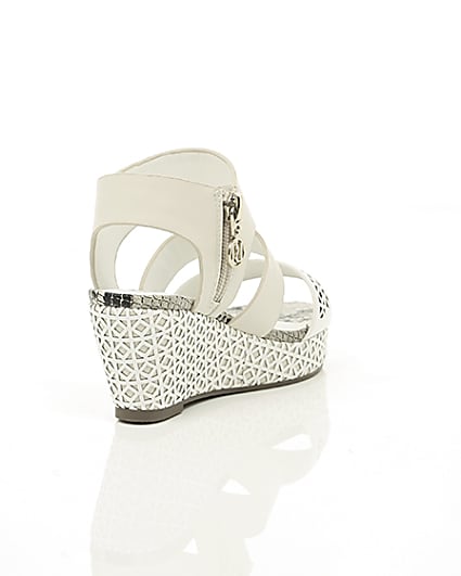360 degree animation of product Girls white laser cut wedges frame-14