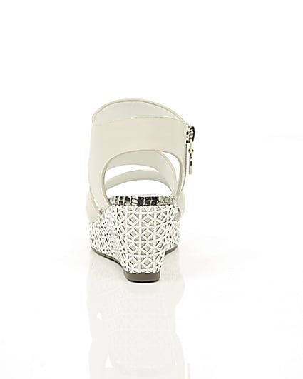 360 degree animation of product Girls white laser cut wedges frame-16