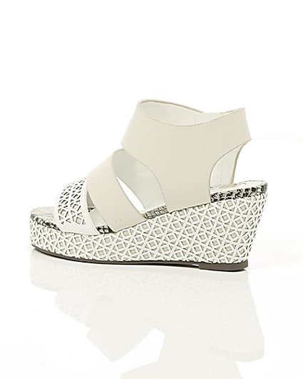 360 degree animation of product Girls white laser cut wedges frame-20