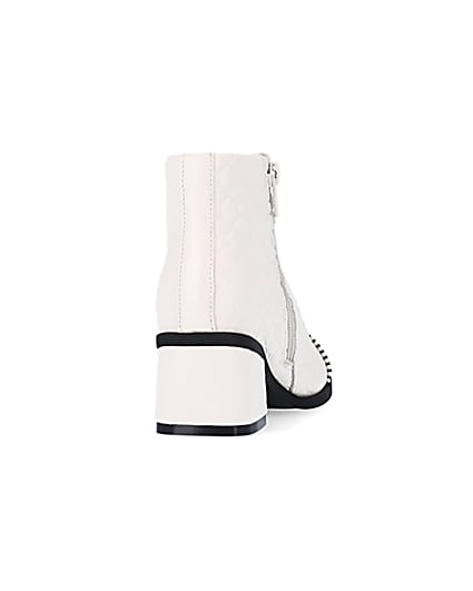 360 degree animation of product Girls White Quilted Studded Heeled Boots frame-10